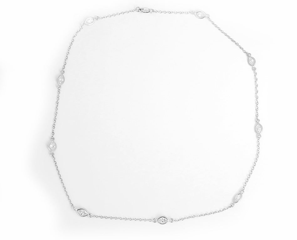  This amazing necklace features 2.65 ctw. of marquis-cut diamonds (J-K-L color and I-clarity)  set in 14k white gold. Necklace measures apx. 19-1/2 inches in length. Total weight is 6.20 grams.  This necklace is perfect for any look!