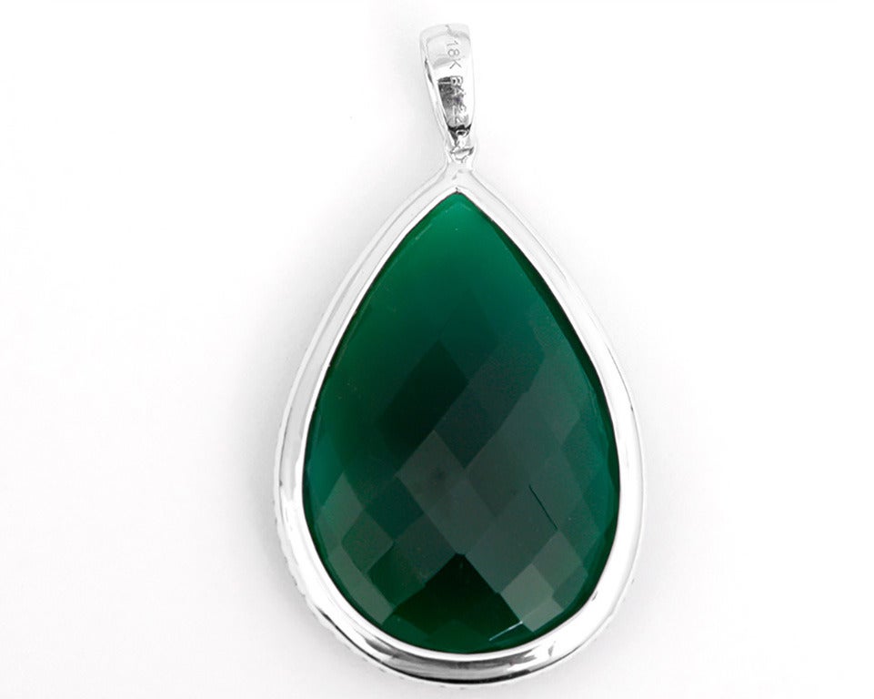 This amazing piece features 22 carats of green agate and 0.36 carats of white diamonds surrounding it on an 18k white gold triple chain.  Chain meaures apx. 16-1/2 inches in length. Pendant measures apx.  1-3/4  inches in length and apx. 7/8 inches