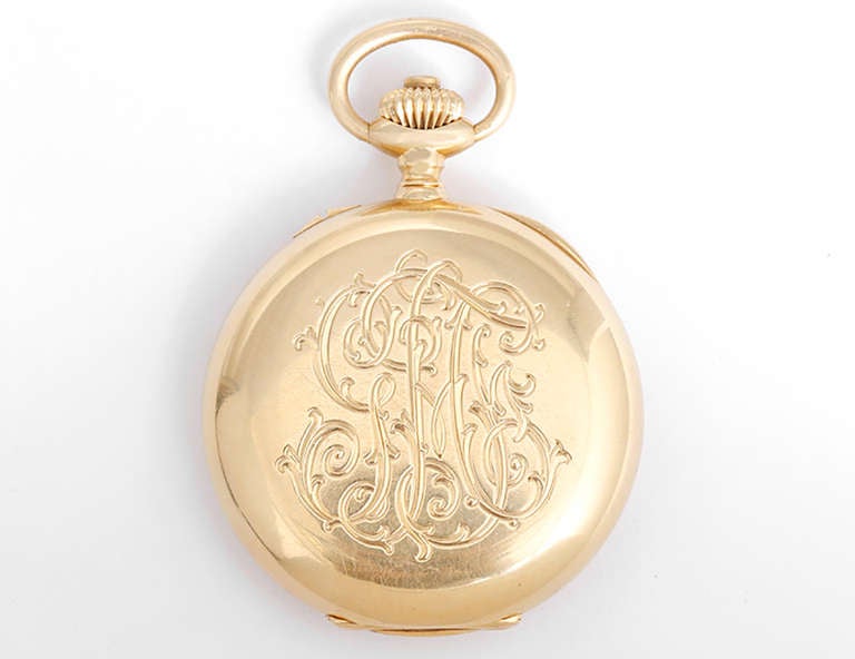18k yellow gold open face case, 46mm diameter, circa 1909, with ornate monogram on back. White enamel dial with Breguet numerals, 30 minute register to the top and subsidiary seconds to the bottom, filigree hands. 

This is a very rare,