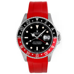 Montre-bracelet Rolex GMT-Master II en acier inoxydable avec bracelet en caoutchouc rouge Ref 16710