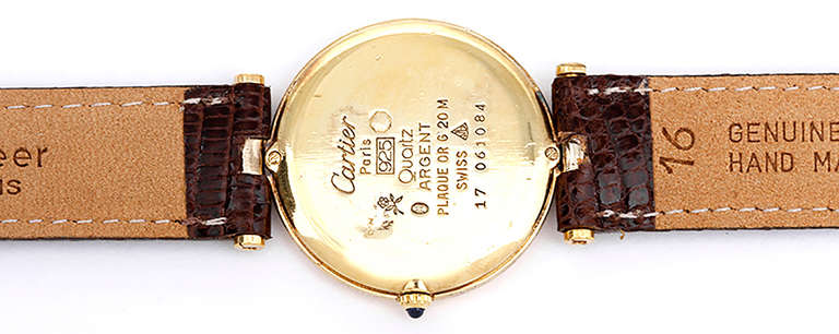 Ref. W1001853. Quartz movement. Silver-gilt case, 30mm. Brown dial. Brown lizard strap. Circa 1990s.
