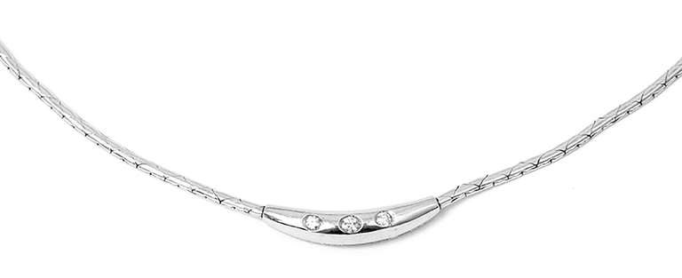 This beautiful yet simplistic 14k white gold three-stone diamond necklace is perfect any look! It measures apx. 16-inches in length with a total weight of 16 grams.