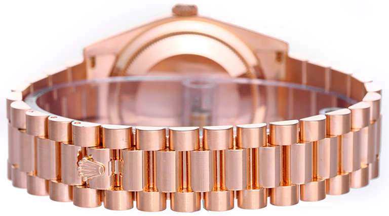 Automatic movement, 31 jewels, Quickset date, sapphire crystal. 18k rose gold case with smooth bezel, 36mm diameter. Rose dial with rose gold Roman numerals. 18k rose gold President bracelet. Pre-owned with box and books.

Current Replacement