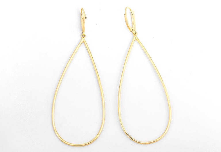 These are very elegant 14k yellow gold teardrop earrings. They feature sparkling diamonds with a carat total weight of 1.016. The earrings are apx. 3-inches in length and 1-1/8 inch at the widest.  Lever back closure. The total weight is 5.5 grams.