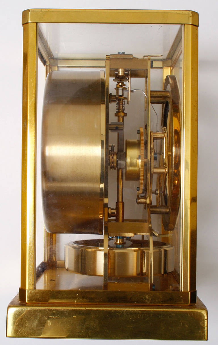 Perpetual.  Brass & glass case measures apx. 6-1/2