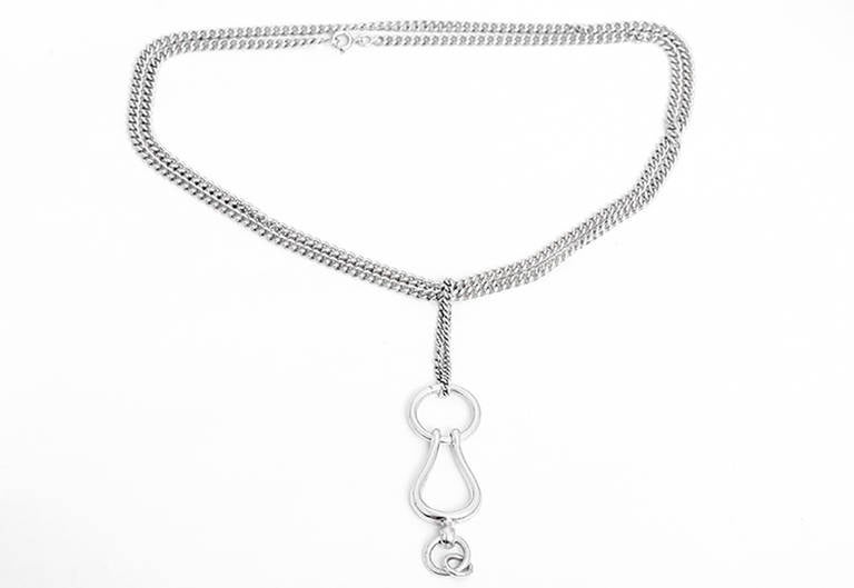 This amazing Hermes stirrup necklace is sterling silver and stamped Hermes, AG925. The necklace is apx. 32-inches in length and can be single or double looped. Total weight is 37.8 grams. Hermes box included.