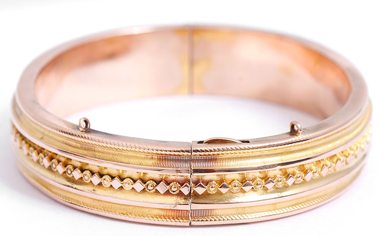 This lovely bracelet fits a 7 inch wrist quite nicely and is very comfortable to wear. It is about 3/8 inch in width and has a total weight of 17 grams. It is missing the safety chain but has a sturdy clasp.  This piece is an old piece and not in