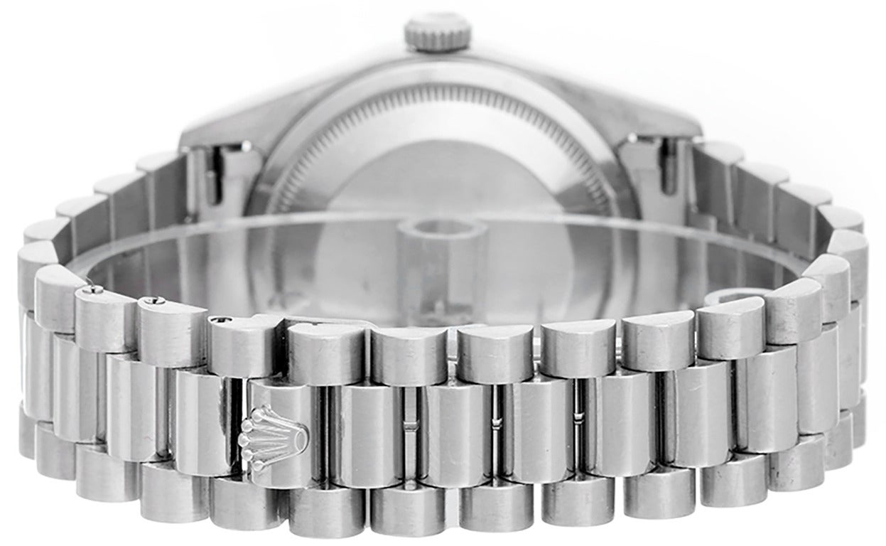 Automatic winding, 31 jewels, Quickset, sapphire crystal. Platinum case with smooth bezel  (36mm diameter). Factory silvered diamond dial. Platinum hidden clasp President bracelet. Pre-owned with box and books. Current Replacement Value: $47,750.00