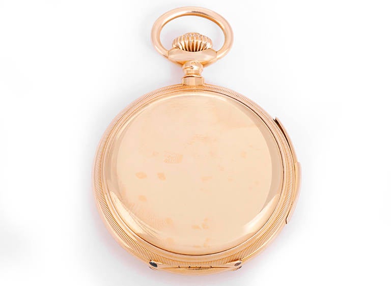 18k yellow gold hunting case (53mm diameter). White enamel dial with black and red Arabic numerals. Circa 1886. Case, dial and movement signed Patek Philippe.