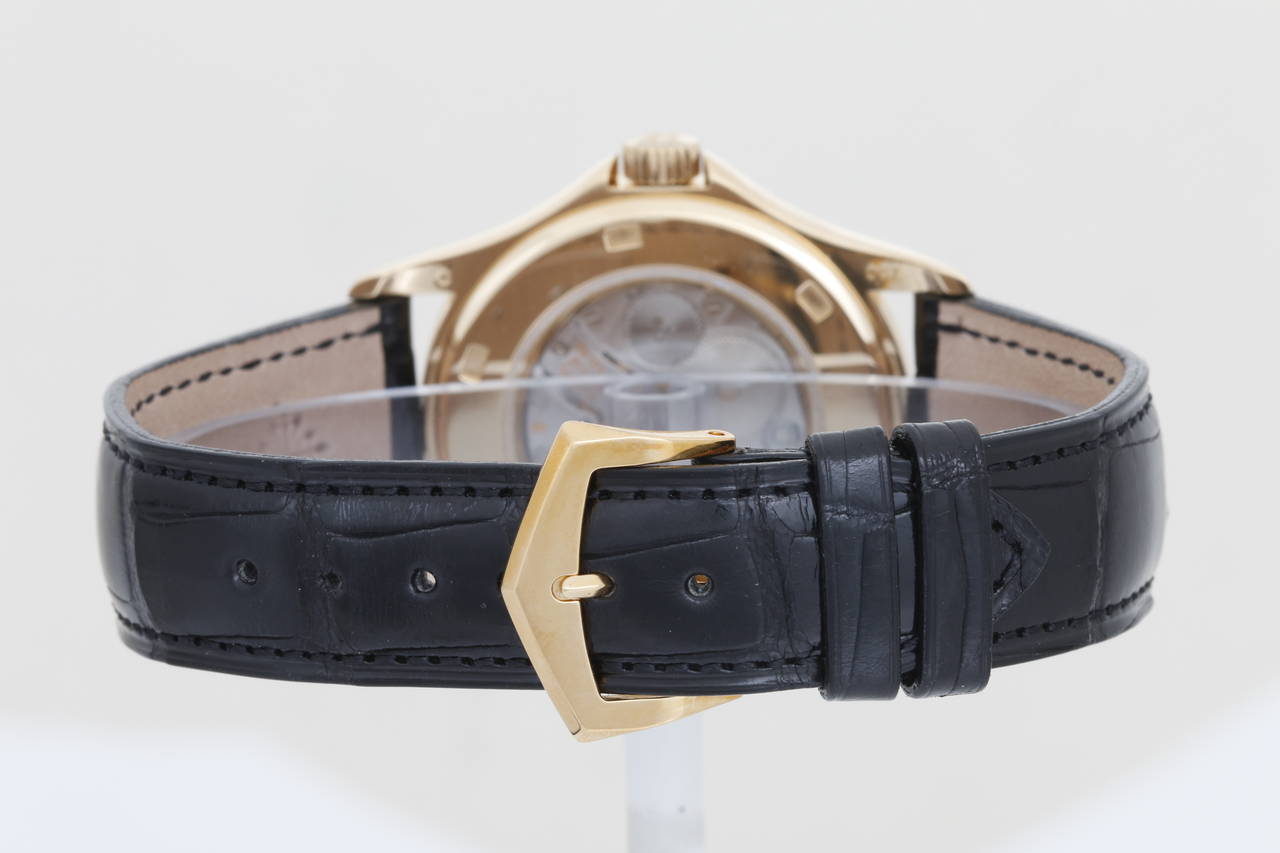 Patek Philippe Yellow Gold Travel Time Wristwatch In Excellent Condition In Dallas, TX