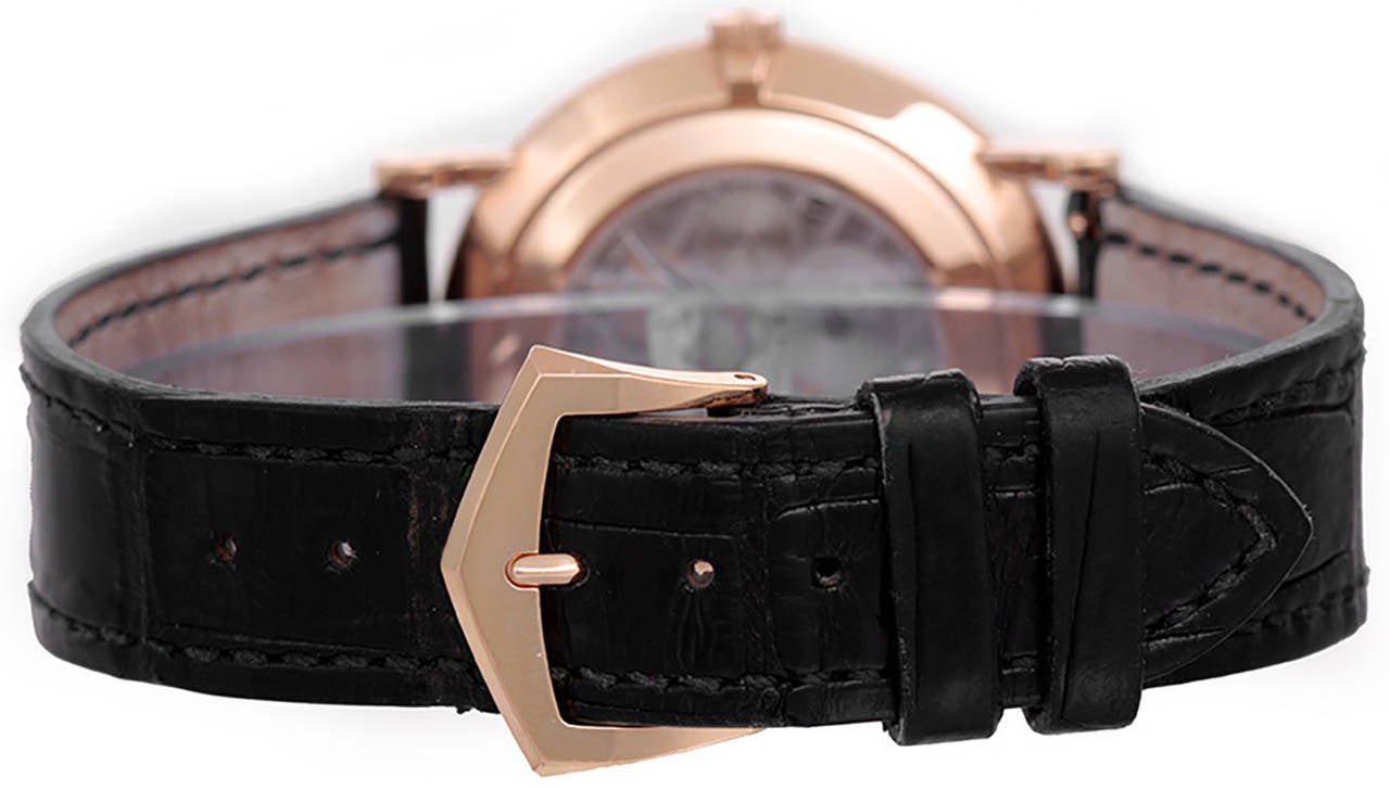 Manual-wind movement. 18k yellow gold case with hobnail bezel and exposition back, 36mm diameter. White dial with black Roman numerals, subsidiary seconds. Strap with 18k yellow gold Patek Philippe buckle. Pre-owned with Patek Philippe box and