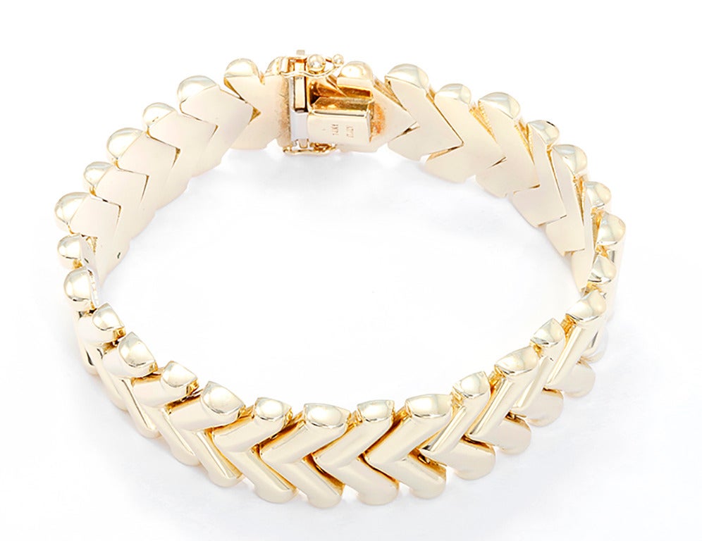 This beautiful 14k yellow gold chevron link bracelet measures apx. 7.5-inches in length with a total weight of 35.6 grams. This bracelet is great for casual wear or occasions!