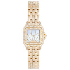 Cartier Lady's Yellow Gold and Diamond Panther Wristwatch with Bracelet