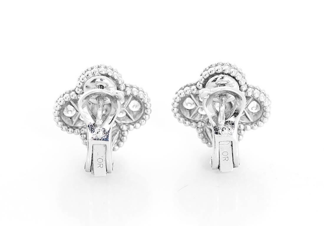 These amazing Van Cleef & Arpel earrings a part of the Vintage Alhambra collection featuring pave diamonds in 18k white gold. Total weight is 9.8 grams. Earrings are signed, 'VCA AU750 JB151659'. Box and certificate of authenticity included.