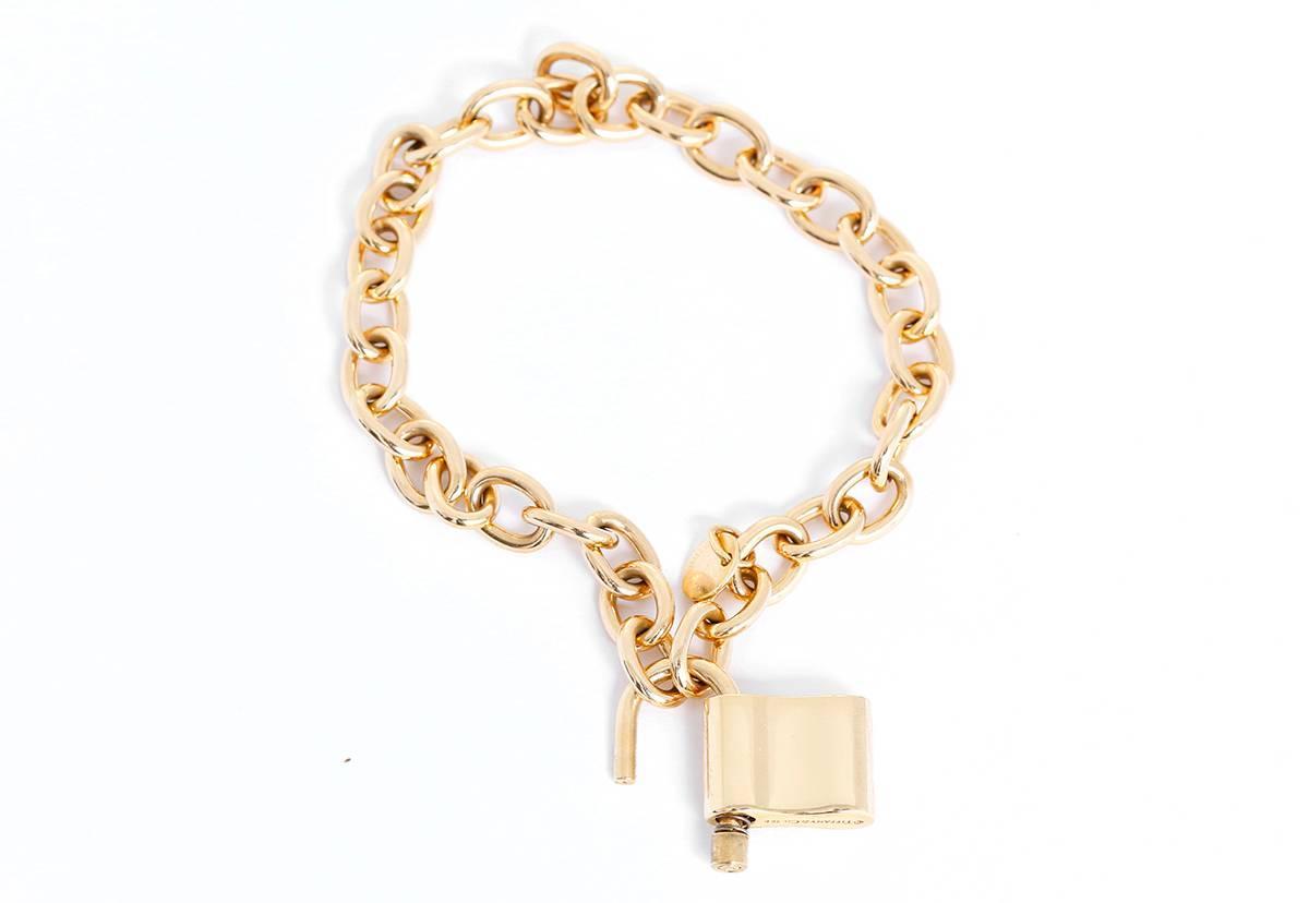 Tiffany and Co. Gold 1837 Padlock Charm Chain Link Bracelet at 1stdibs