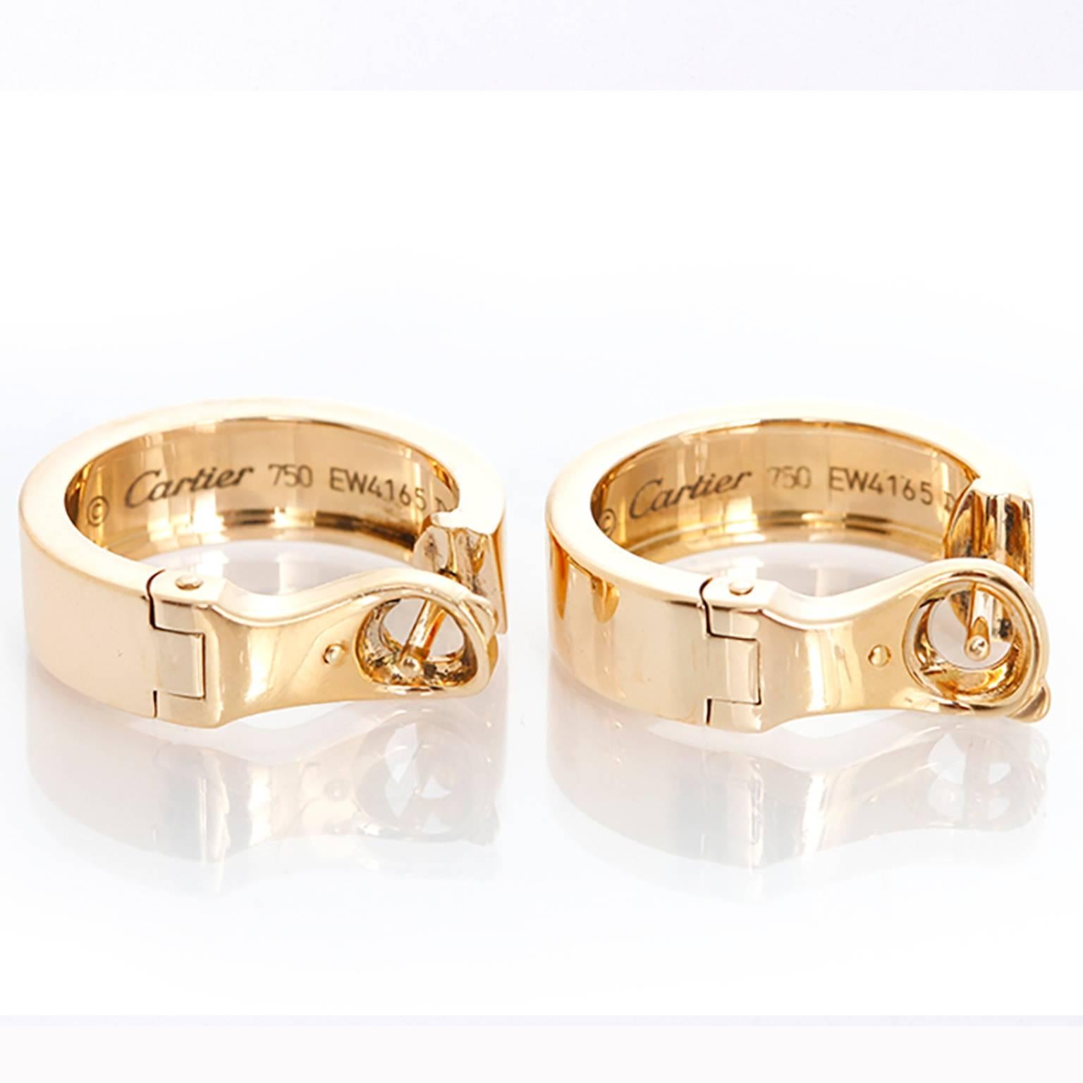 Cartier LOVE 18k Yellow Gold Hoop Earrings -  These Cartier LOVE earrings are timeless and are perfect for any look! The earrings are stamped Cartier, 750 and EW4165. The earrings measure apx. 1/4-inch in width and apx. 3/4 -inch in length.  Total