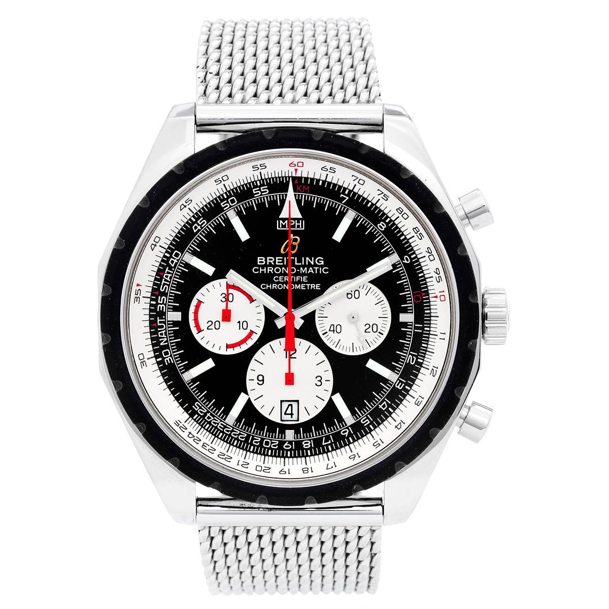 Breitling Chronomatic Automatic Men's Watch -  Automatic (50mm). Stainless Steel. Black Dial with date at 6:00 'o clock; three sub dial's at 3, 6 and 9 'o clock.. Breitling Rubber Strap Bracelet with Breitling Deployant Clasp. Pre-Owned with Box 