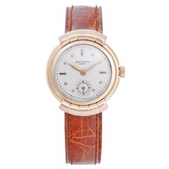 Patek Philippe Tricolor Gold Hooded Lug Automatic Wristwatch, circa 1940s