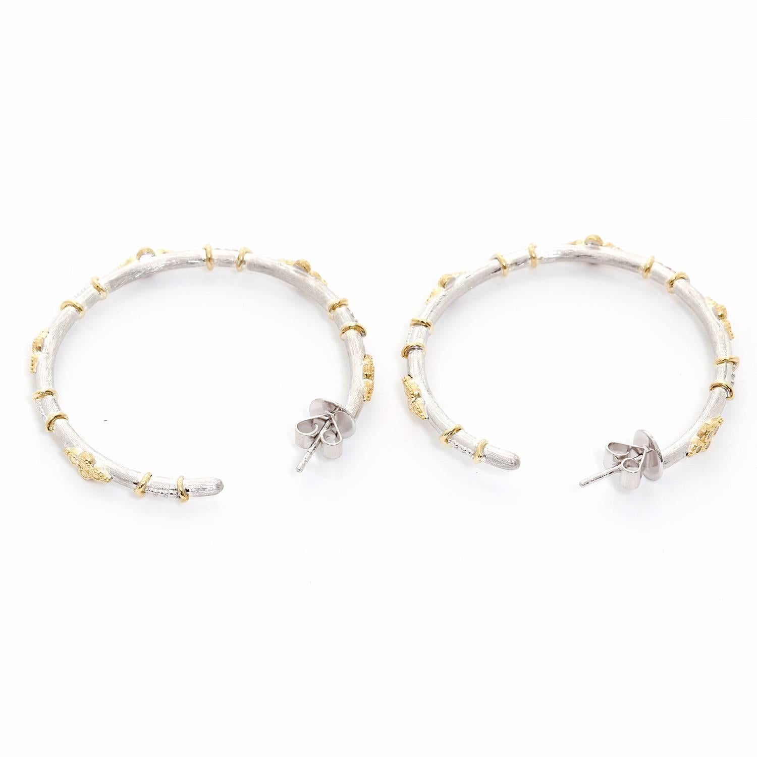 Jude Frances Mixed Metal Hoops Earrings - . Mixed Metal Large Hoop earring with Gold accents with pave bezel set round diamonds in sterling silver with 18K Yellow gold accent. Total diamond weight .25 cts. Total length 40 mm. Total width 2 mm.
