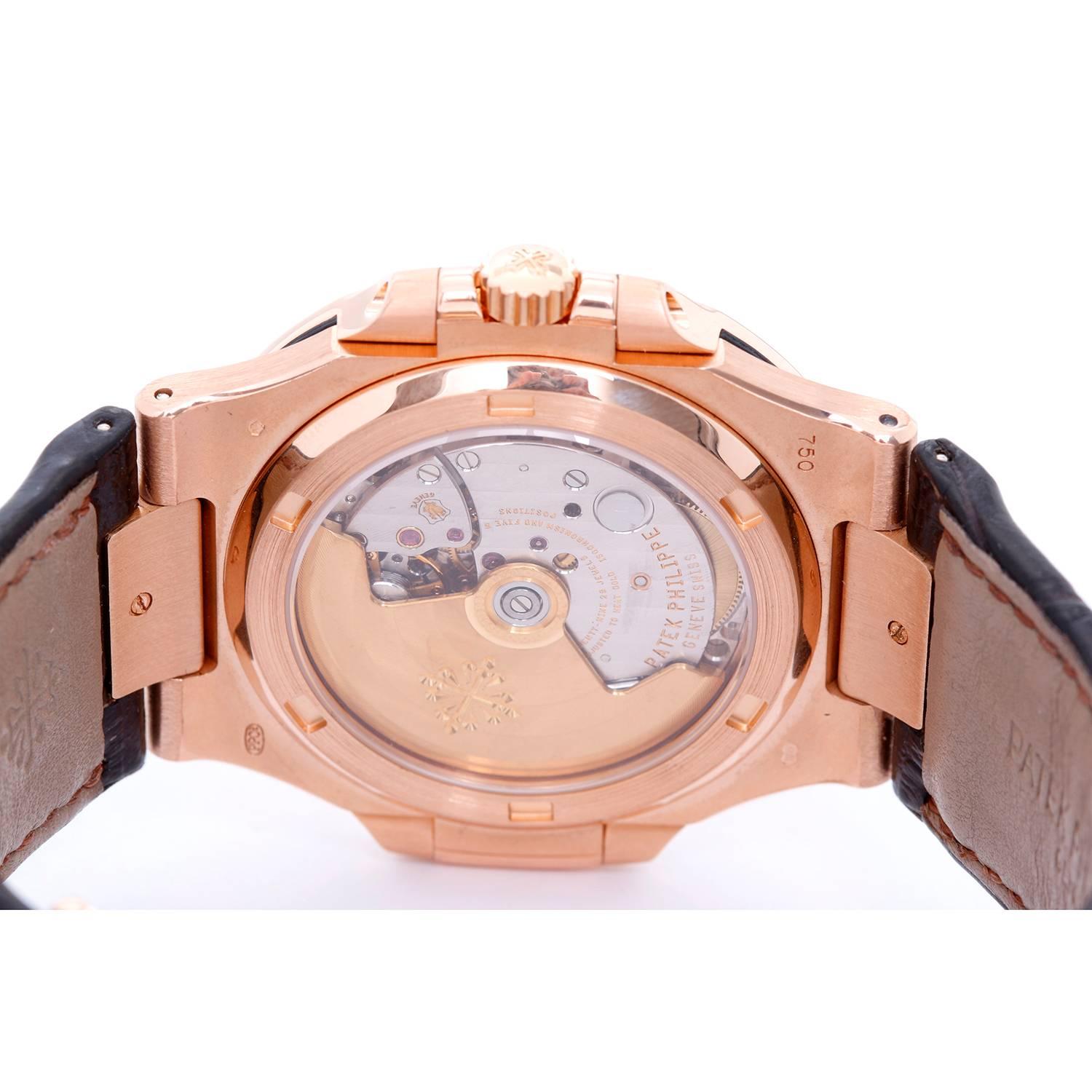 Patek Philippe & Co. Rose Gold Nautilus Automatic Wristwatch Ref 5711R-001 In Excellent Condition In Dallas, TX