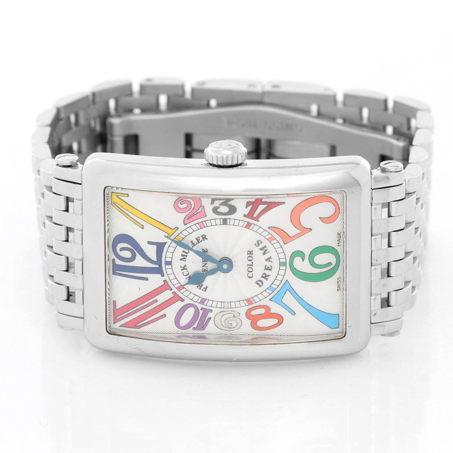 Automatic winding. Stainless steel case (26mm X 36mm). Silvered guilloche dial with multi color Arabic numerals. Stainless steel Franck Muller bracelet. Pre-owned with custom box.