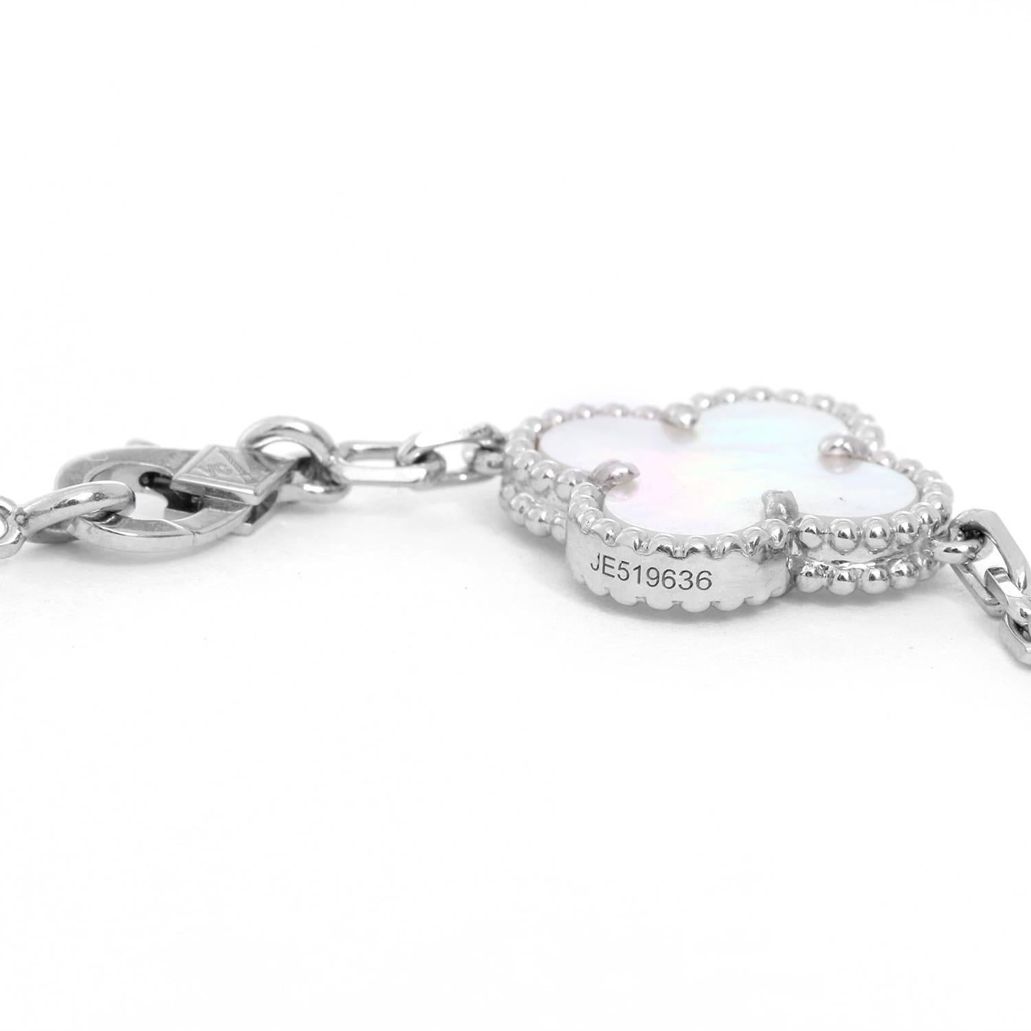 Van Cleef & Arpels Vintage Alhambra White Gold Mother of Pearl Bracelet -  Vintage Alhambra White Gold, 5 motif Mother of Pearl Bracelet. Hallmark, designers mark. Wrist size 7.2 inches. Pre-owned with Van Cleef & Arpels box and papers.