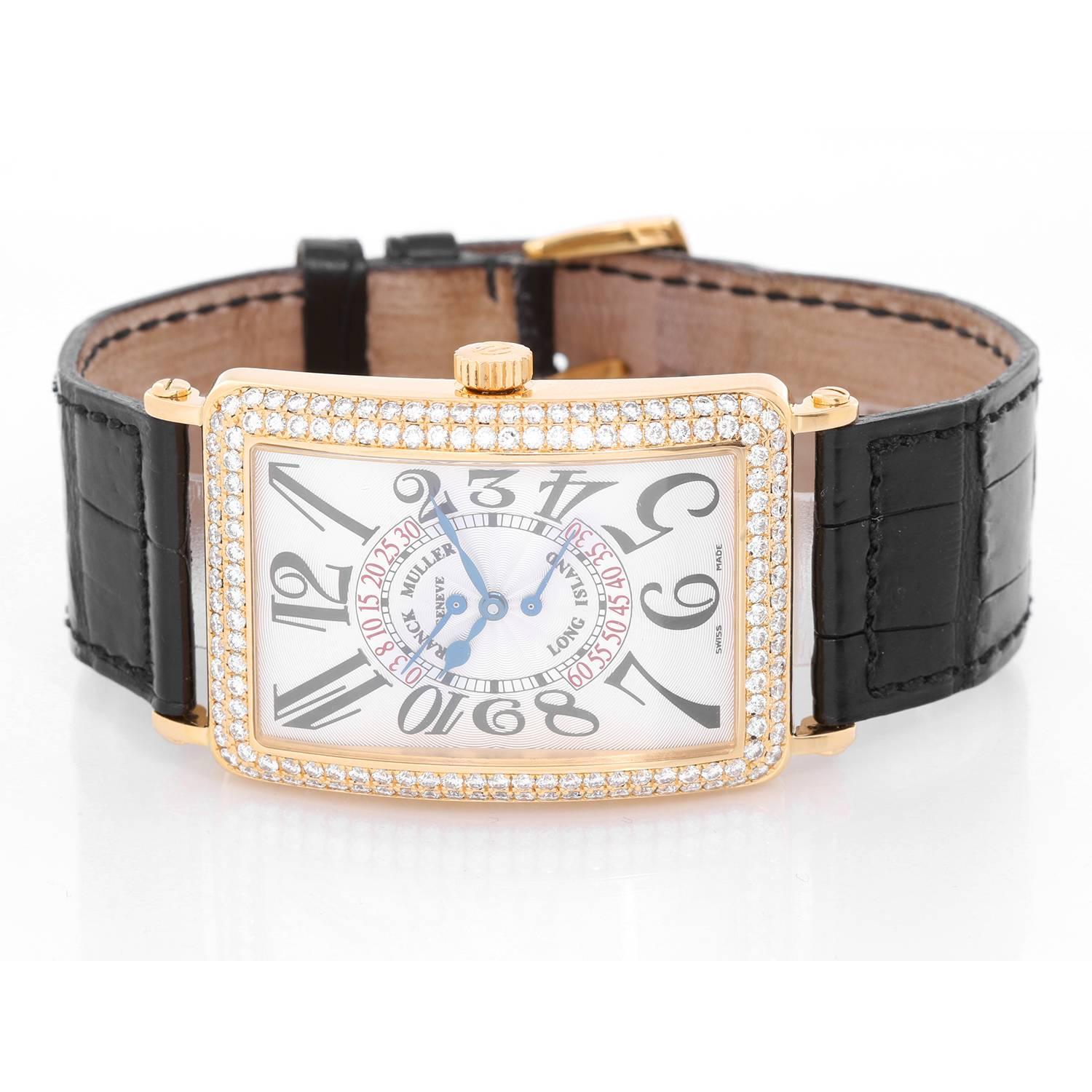 Franck Muller 18K Yellow Gold Long Island Watch -  Automatic. 18K Yellow gold ( 33 mm x 45 mm ) 2.71 cts. Of Round brilliant cut diamonds on bezel. Crème Guilloche dial with Arabic numerals. Brown alligator strap with 18K Yellow gold diamond tang
