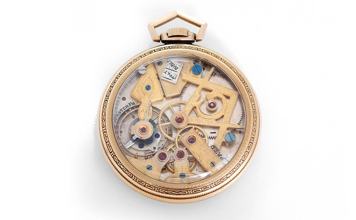 Manual winding. Gold filled case; bezel has black enamel A glass back to view movement featuring Masonic symbols and an open Bible  (45mm diameter). Very rare dial with Masonic symbols as hour markers; subseconds at 6 o'clock; silver color.