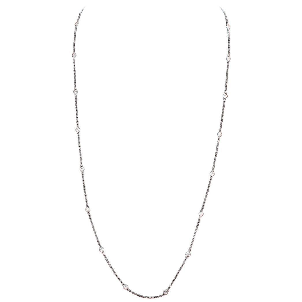 14K White Gold Diamond by the Yard Necklace - .  18K White Gold with 1.10 cts Round brilliant cut diamoinds. 21 Brilliant stones.  30 inches in length. Total weight 5.3 grams.