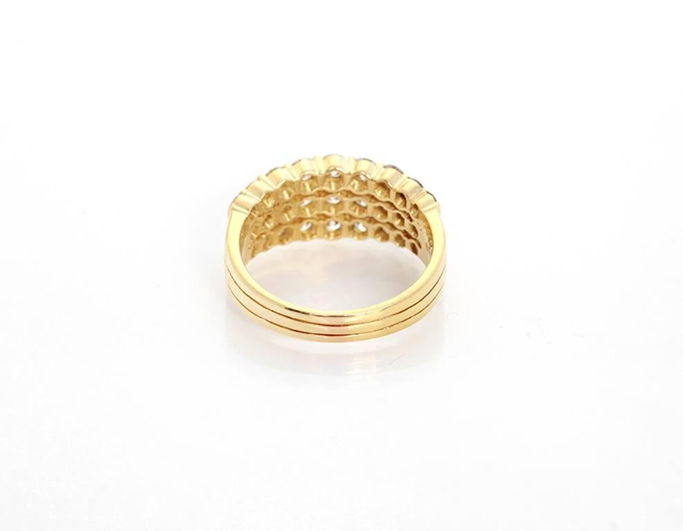 This amazing ring features 2 carats of SI1 clarity and G-H color diamonds set in 18k yellow gold. Total weight is 6.8 grams. Size 7.5. This ring is absolutely stunning and also makes a great wedding band!