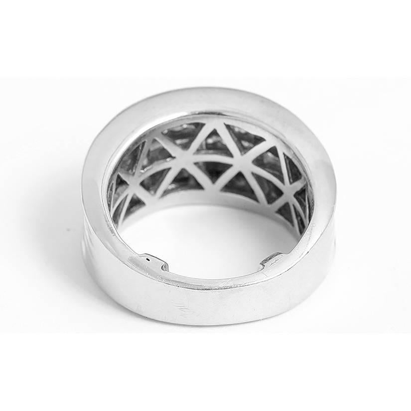 Sparkling 14k White Gold and Diamond Ring - The band is apx. 3/8 inch wide with four rows of channel set white diamonds, weighing apx. 2 ct. Ring size is 5-1/2.