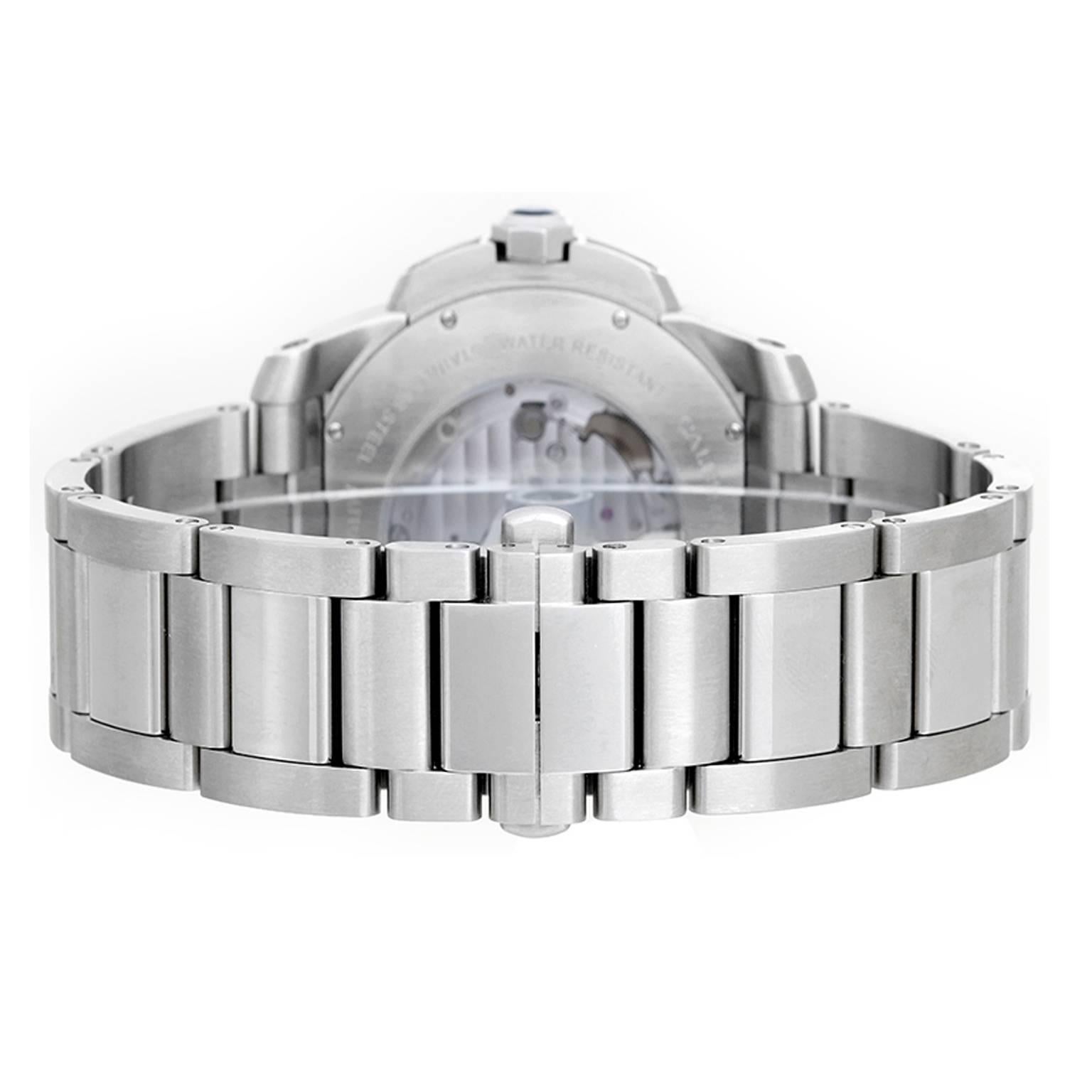 Cartier Calibre Stainless Steel Men's 42mm Watch W7100015 -  Automatic winding. Stainless steel case with exposition back  (42mm diameter). Silvered dial with Roman numerals; subseconds; date at 3 o'clock. Stainless steel Cartier bracelet. Pre-owned