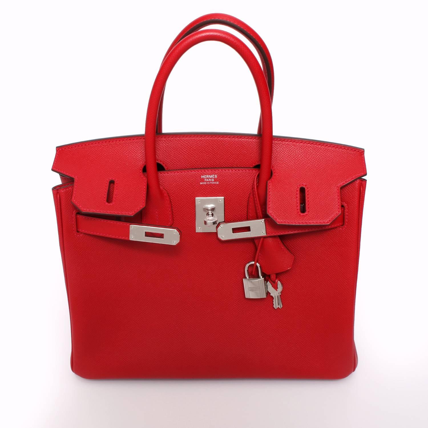 Hermes Birkin Bag 30 cm Rouge Casaque Togo Palladium Hardware. Brand new in box. Store fresh. Pristine condition (with plastic on hardware). Purchased at the Hermes store in January, 2018
Bag is a 2017 model but bought new and never used. Comes with