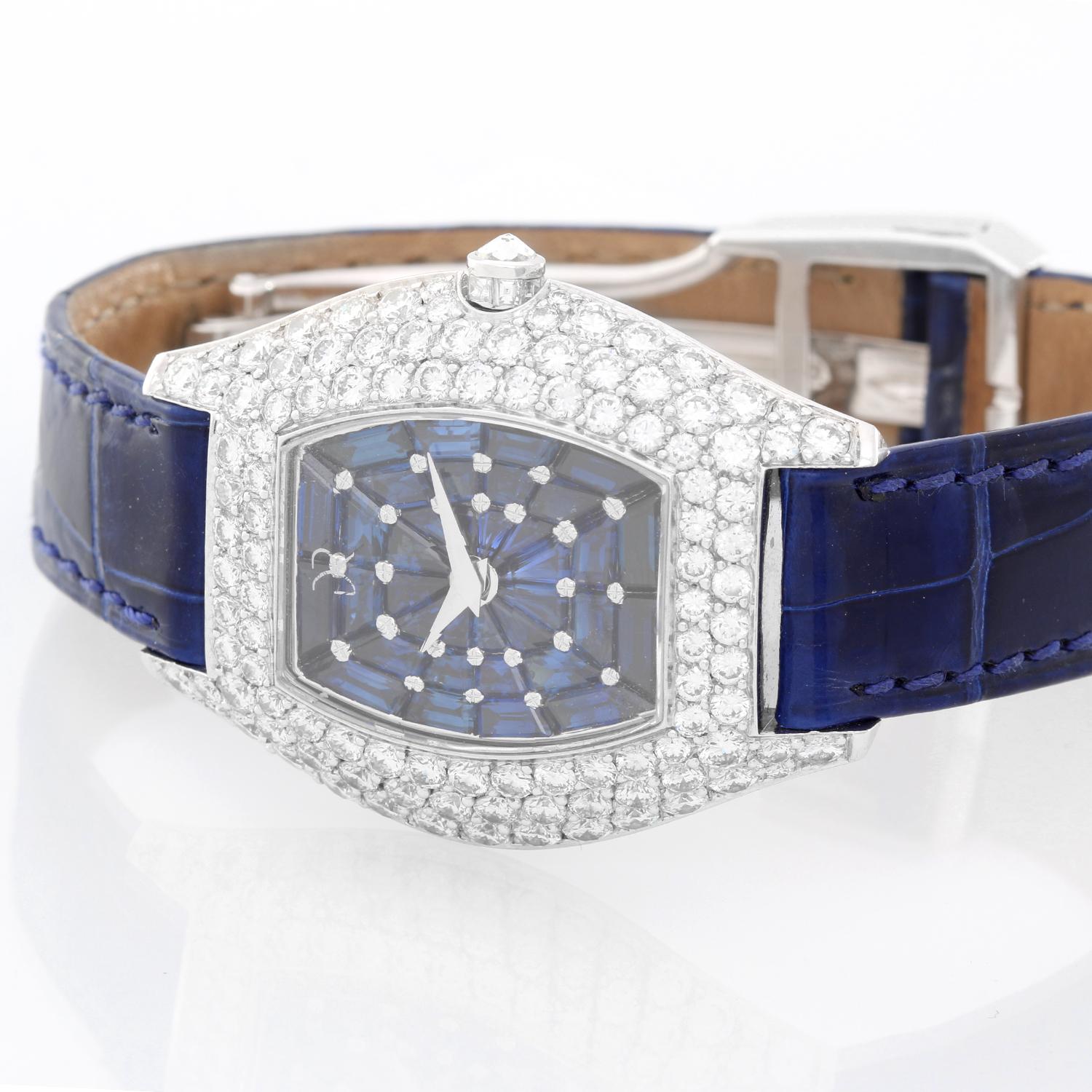 Daniel Roth Classique 18K White Gold Ladies Watch - Quartz. Tonneau 18K White Gold with 5.24 cts of diamonds ( 31 mm ). Blue sapphire dial with diamonds. Blue alligator strap with deployant clasp. Pre-owned with custom box .