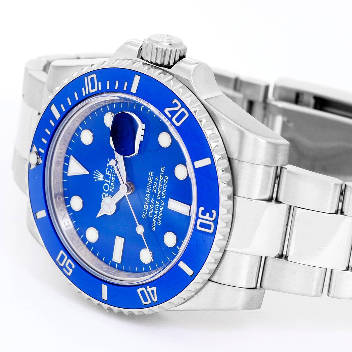 Automatic winding, 31 jewel, sapphire crystal. 18k white gold case with rotatable blue ceramic bezel (40mm diameter). Blue dial with luminous style markers; date at 3 o'clock position. 18k white gold Oyster bracelet with Glidelock clasp. Pre-owned