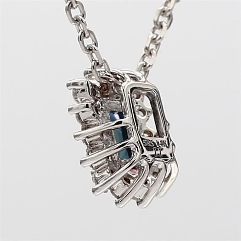Contemporary Natural Blue Emerald Cut Sapphire and White Diamond .49 Carat TW Gold Pendant For Sale