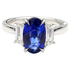 GIA Certified Deep Blue Oval Sapphire and Diamond 4.12 Carat TW Gold Ring