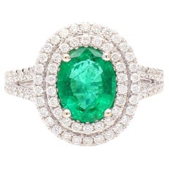 Natural Oval Emerald and White Diamond 2.18 Carat TW Gold Cocktail Ring