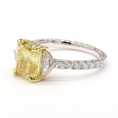 GIA Certified Fancy Yellow Radiant Diamond 3.74 Carat TW Gold Cocktail Ring