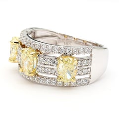 Natural Yellow Oval Diamond 2.14 Carat TW Gold 3-Stone Cocktail Ring