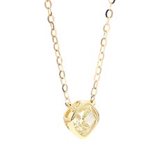 Collier en or avec un diamant naturel jaune clair certifié GIA, taille « coussin », de 0.73 carats TW