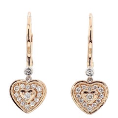 Orecchini in oro con diamante tondo bianco naturale da 0.30 carati TW