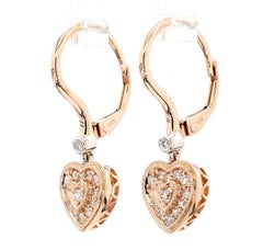 Orecchini in oro con diamante tondo bianco naturale da 0.30 carati TW