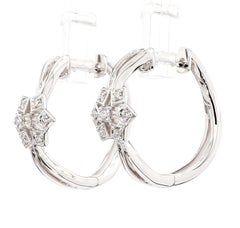 Orecchini in oro con diamante tondo bianco naturale da 0.14 carati TW