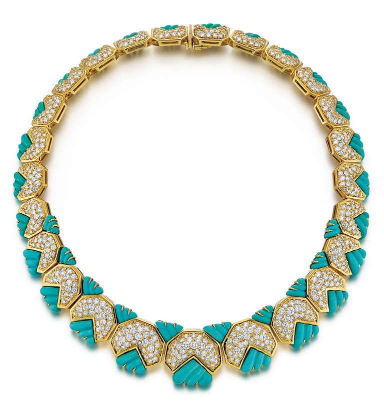 Hammerman Bros. collar necklace is composed of 18K yellow gold with carved turquoise and diamonds.   There are 645 round diamonds that total 35.50 carats, G-H color and VVS-VS clarity.  The necklace measures 16 inches in length.