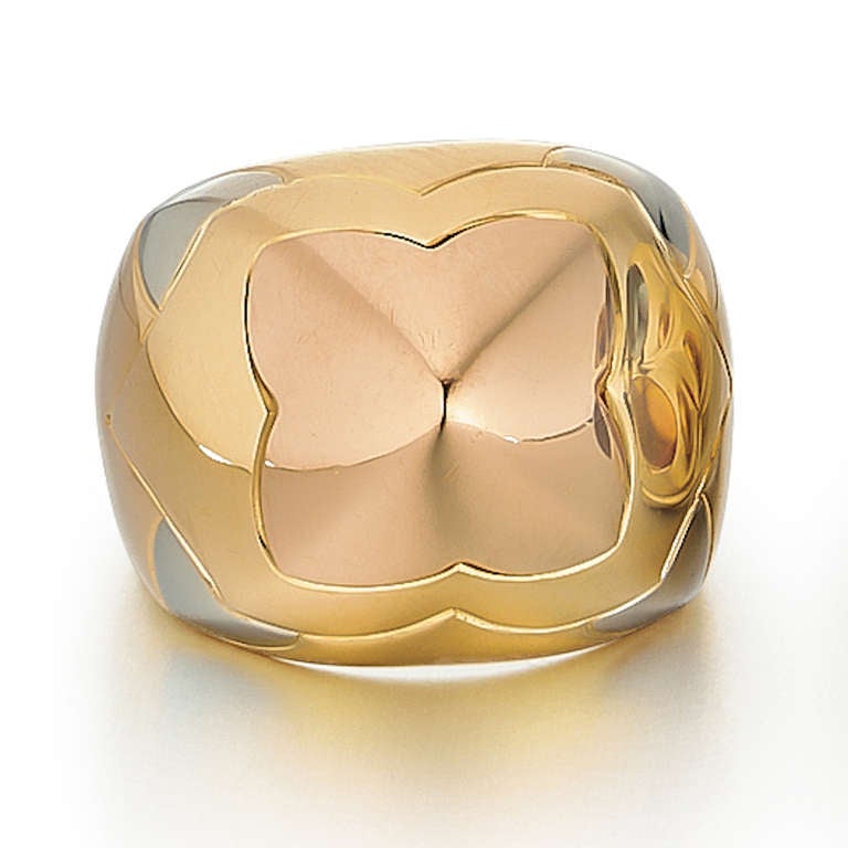 This ring from Bulgari's Piramide collection is 18kt yellow, rose, and white gold. It is finger size 6.75.