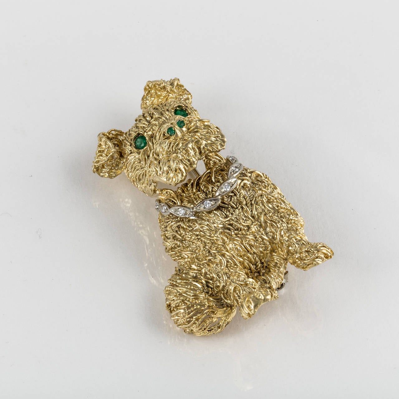 Cute yellow gold brooch marked 