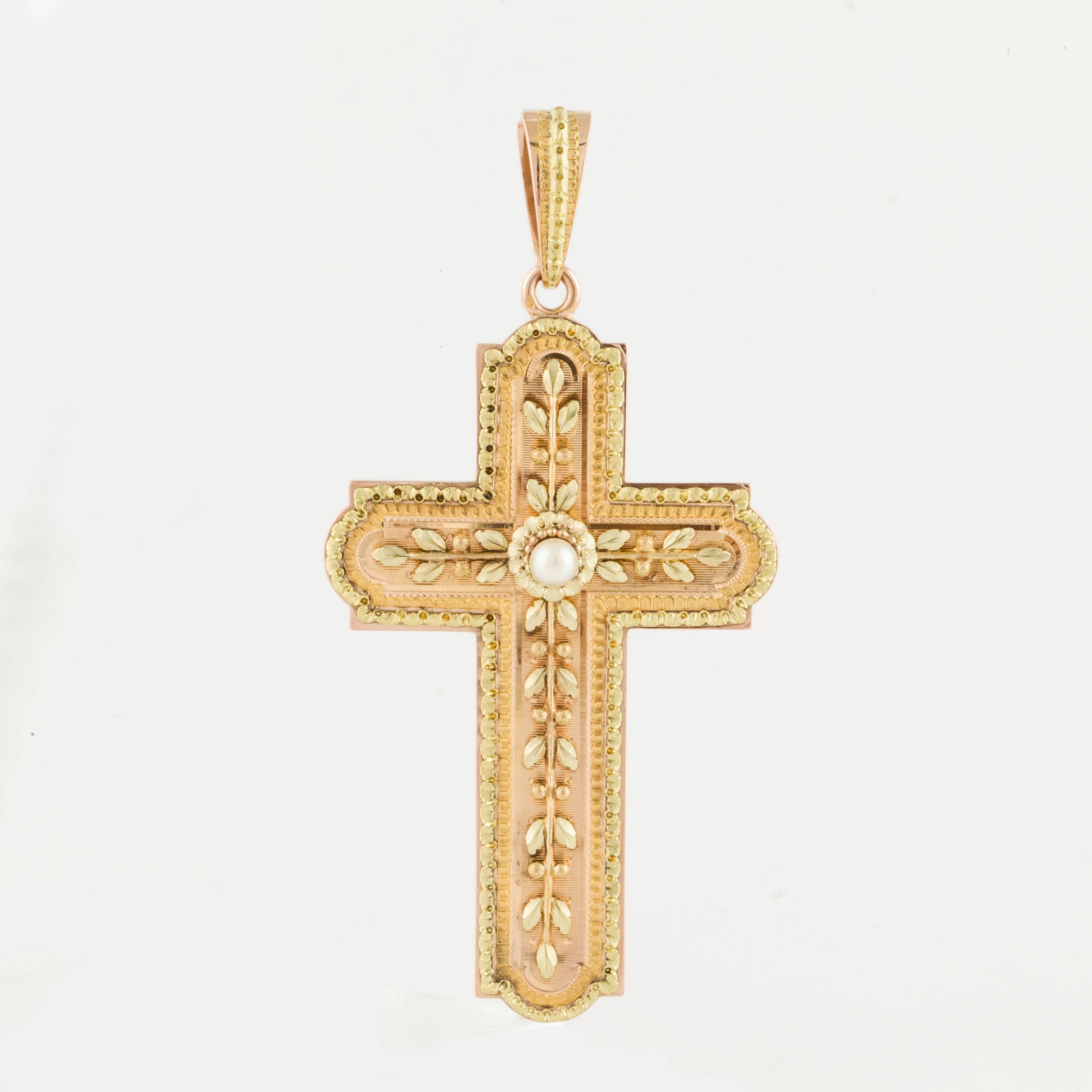 Beautiful 18K cross pendant in two tone gold (yellow and rose).  Delicate Etruscan work and leaf design highlighted with a 4.7mm cultured pearl in the center.  French hallmarks on the back of the bale.  The bale is also decorated with Etruscan work.