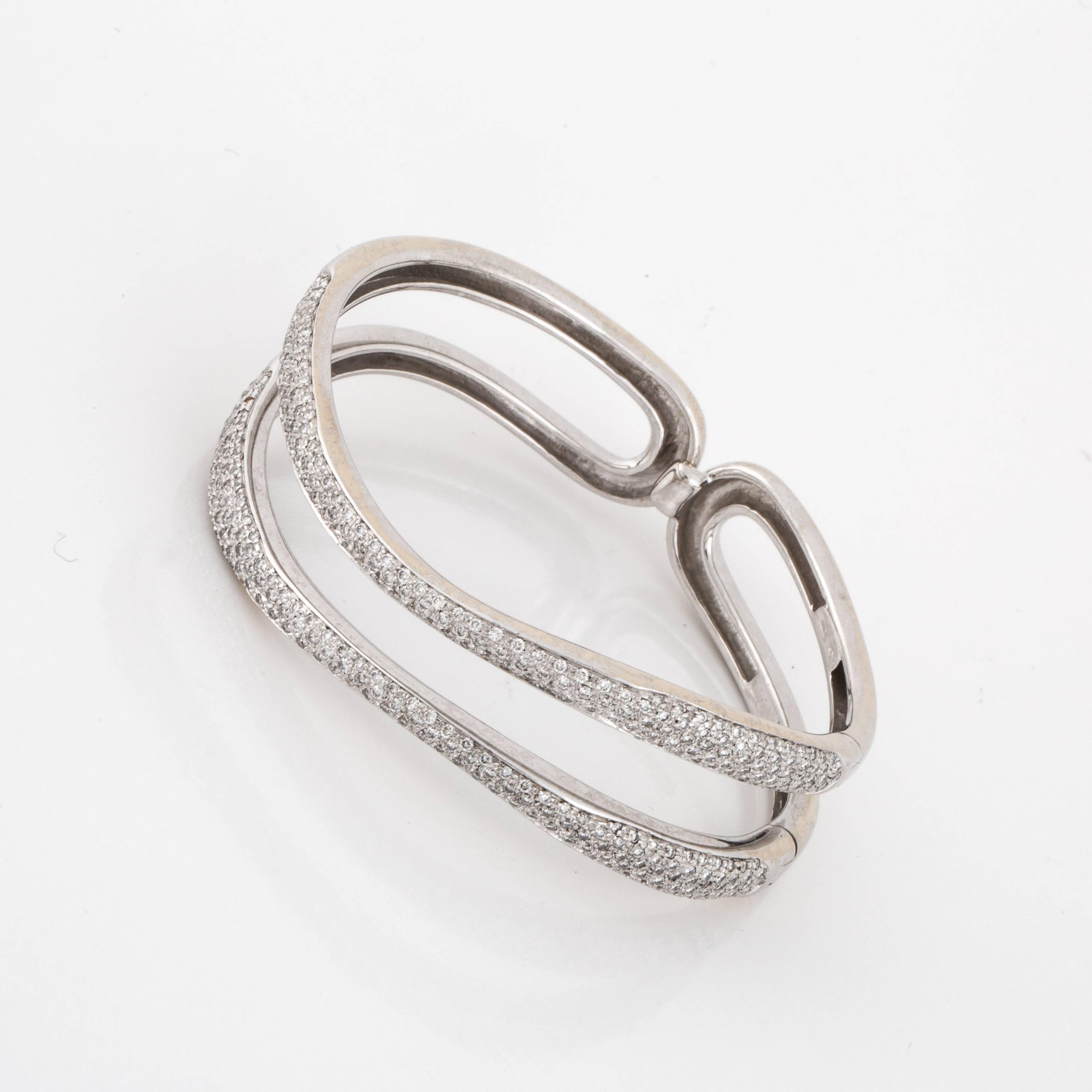 Antonini cuff bracelet in 18K white gold with pavé round diamonds.  Marked 