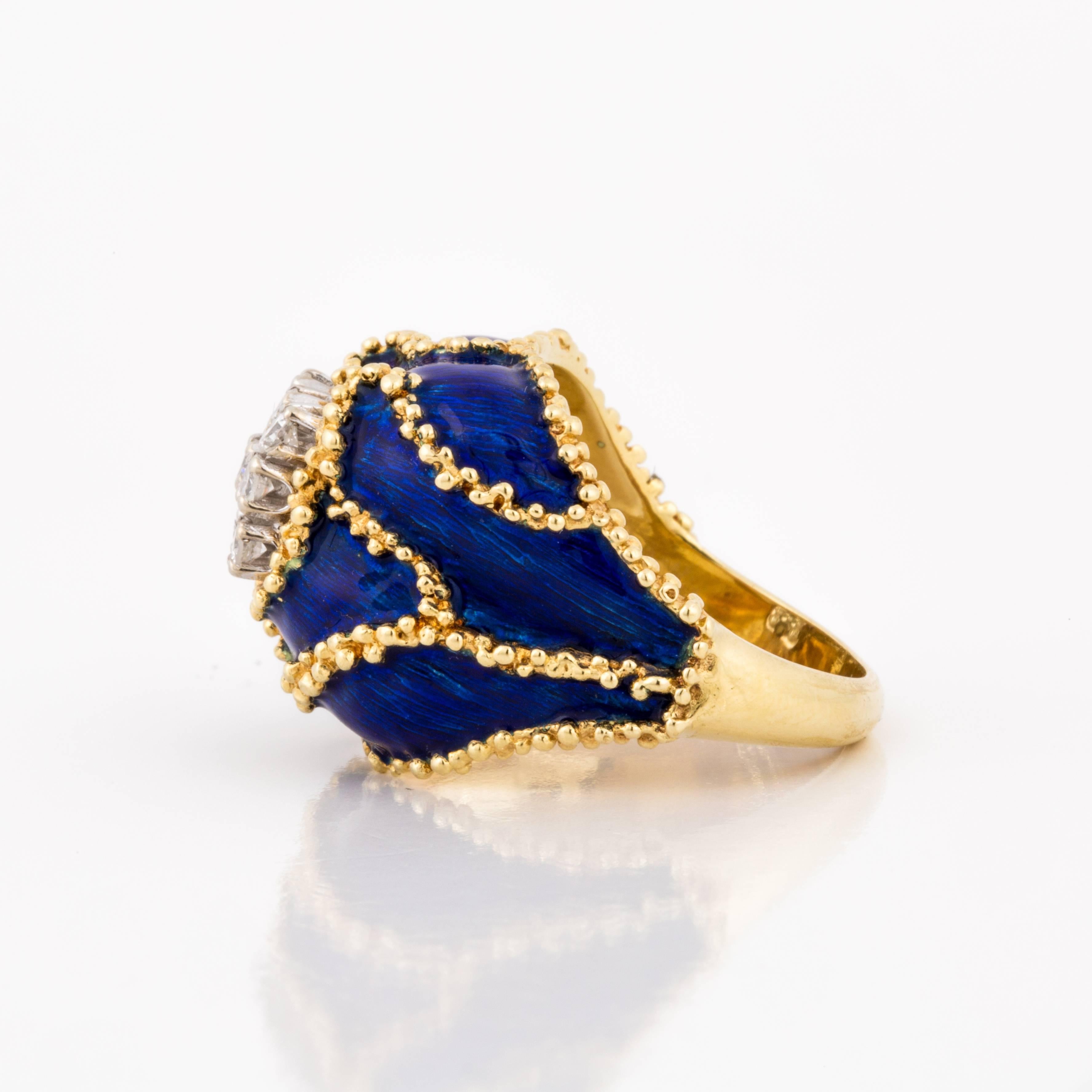 Ring composed of 18K yellow gold with cobalt blue enamel with a twisted rope design running throughout the ring.  There are nine single-cut diamonds centrally set on the top of the ring in a square design.  The round diamonds total 0.35 carats, G-H